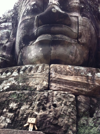 One of Bayon's many carved faces (and yup, that's Danbo posing)